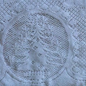 White crochet table cloth for christmas or other holidays